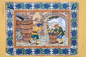Modern Spanish Ceramic Tiles Showing Workers Operating Wine Press in Vineyard Cellar